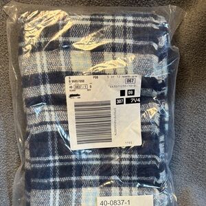 Woman Within Blue and White Plaid Scarf